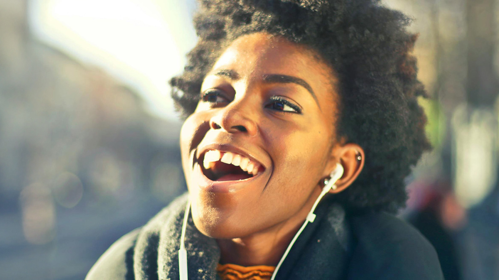 Woman listening to headphones